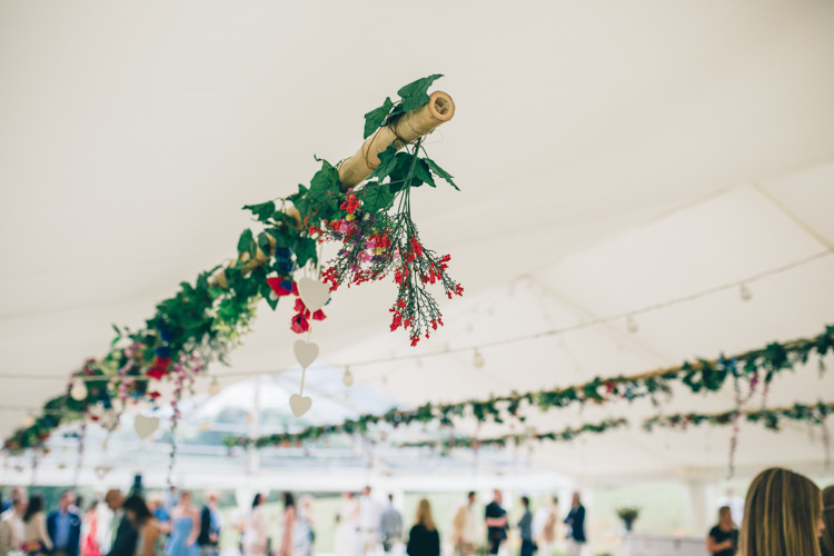 Hanging Flowers Foliage Greenery Marquee Wildflower Village Green Handfasting Wedding http://www.naomijanephotography.com/