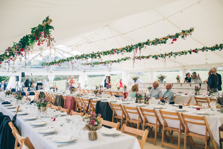 Marquee Hanging Flowers Foliage Greenery Wildflower Village Green Handfasting Wedding http://www.naomijanephotography.com/