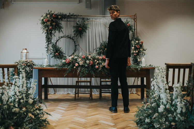 Ceremony Flowers Backdrop Hoops Foliage Aisle Pew End Chairs Table Industrial Into The Wild Greenery Wedding Ideas http://www.ivoryfayre.com/