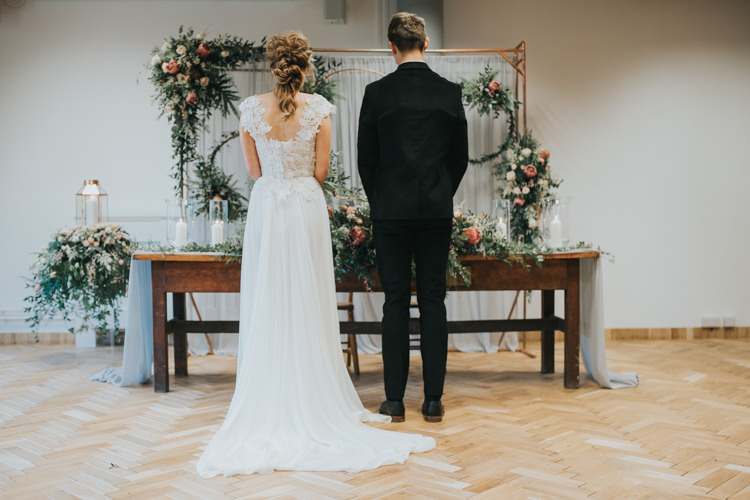 Ceremony Flowers Backdrop Hoops Foliage Aisle Pew End Chairs Table Industrial Into The Wild Greenery Wedding Ideas http://www.ivoryfayre.com/