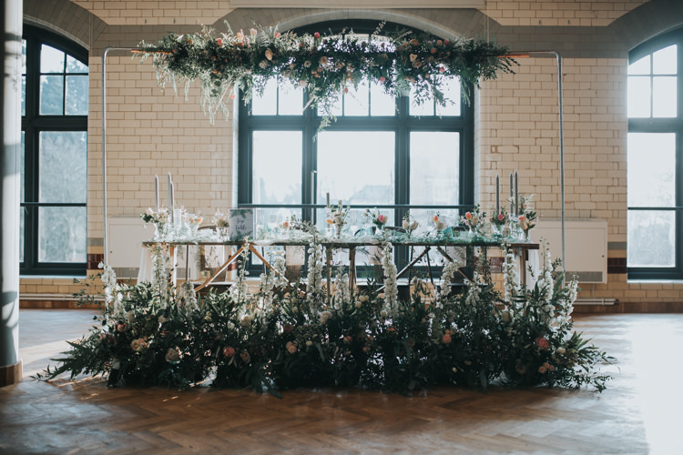 Table Flowers Floor Ceiling Hanging Foliage Decor Table Scape Industrial Into The Wild Greenery Wedding Ideas http://www.ivoryfayre.com/