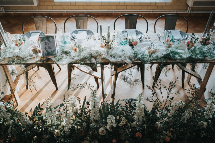 Table Flowers Floor Ceiling Hanging Foliage Decor Table Scape Industrial Into The Wild Greenery Wedding Ideas http://www.ivoryfayre.com/