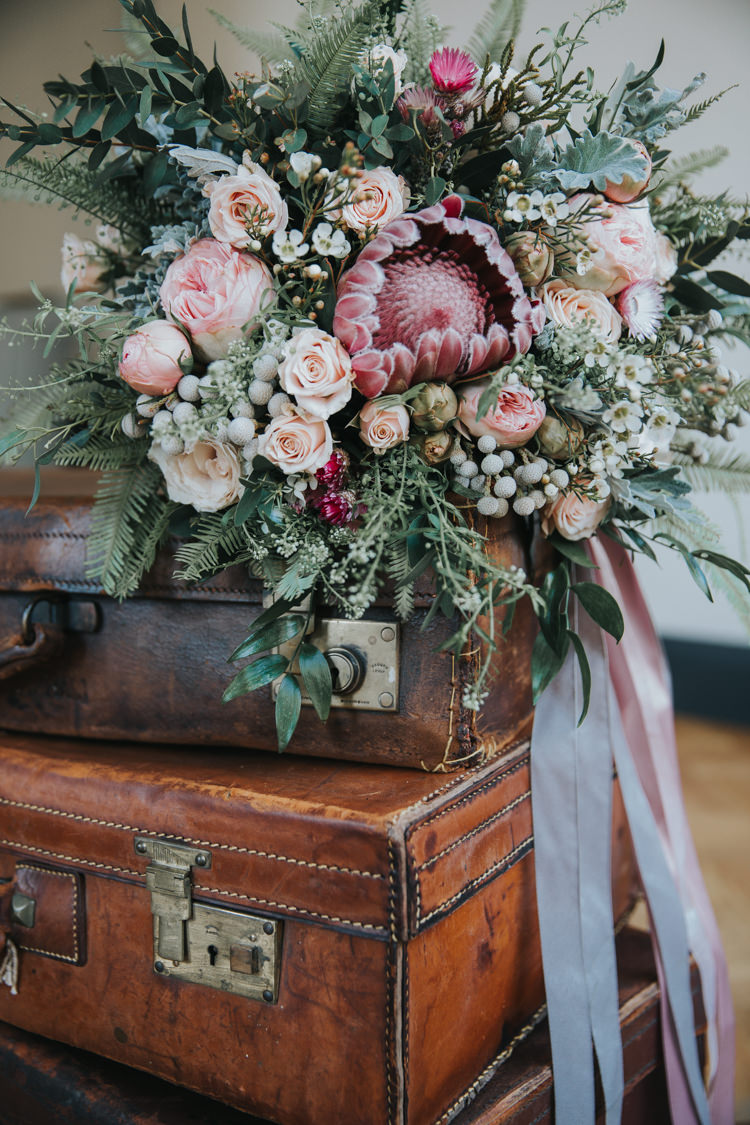 Bouquet Flowers Pink Foliage Roses Protea Bride Bridal Ribbons Industrial Into The Wild Greenery Wedding Ideas http://www.ivoryfayre.com/