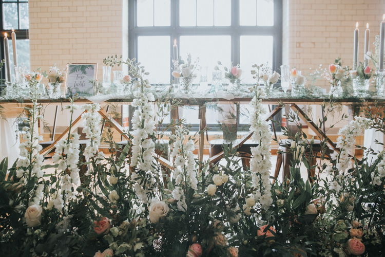 Table Flowers Floor Ceiling Hanging Foliage Decor Table Scape Industrial Into The Wild Greenery Wedding Ideas http://www.ivoryfayre.com/