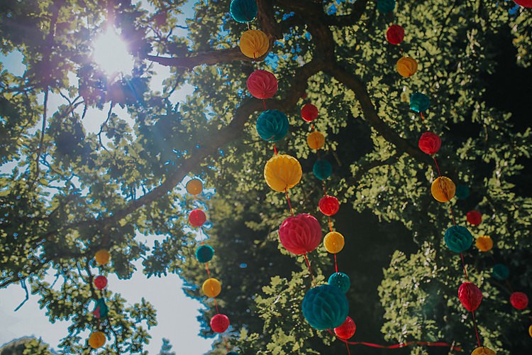 Pom Pom Garland Tree Family Friendly Summer Tipi Outdoor Wedding http://www.brookrosephotography.co.uk/