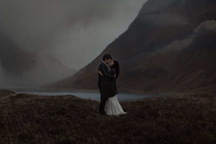 Bride Beaded Chiffon Bridal Gown Black Wrap Groom Black Tailored Suit White Shirt Black Tie Breathtaking Wild Scotland Elopement http://www.theferros.com/