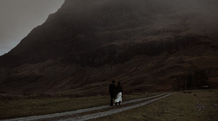 Bride Beaded Chiffon Bridal Gown Black Wrap Groom Black Tailored Suit Hills Clouds Breathtaking Wild Scotland Elopement http://www.theferros.com/
