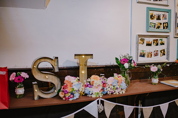 Guest Book Cards Light Up Letters Bunting Multicoloured Flowers Polaroid Frames Colourful Fun Party Brighton Wedding http://jmcsweeneyphotography.co.uk/