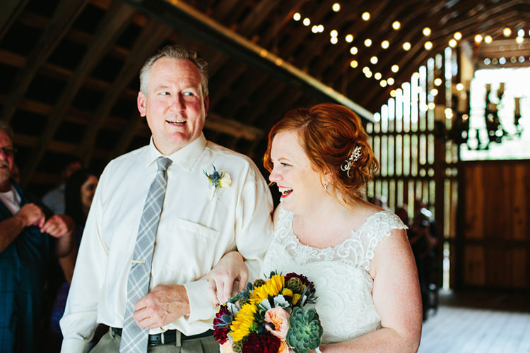Indoor Barn Ceremony Bride Lace Tulle Bridal Gown Multicoloured Bouquet Father Entrance Guests Fairy Lights Creative Quirky Rustic Barn Wedding Tennessee http://www.alexbeephoto.com/