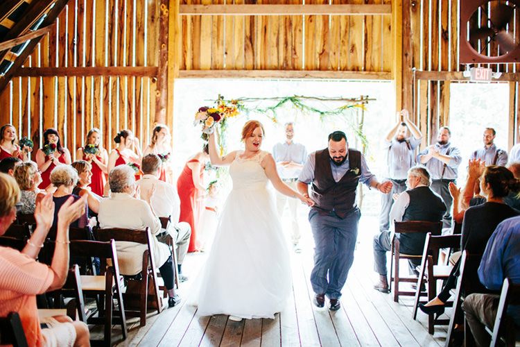 Indoor Barn Ceremony Bride Lace Tulle Bridal Gown Multicoloured Bouquet Groom Light Grey Shirt Custom Vest Dancing Floral Arch Guests Bridal Party Creative Quirky Rustic Barn Wedding Tennessee http://www.alexbeephoto.com/