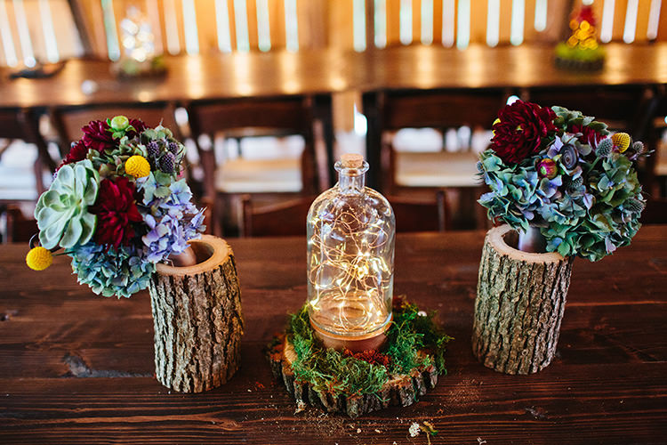 Reception Tree Trunk Vases Multicoloured Blooms Succulents Fairy Light Bottles Greenery Creative Quirky Rustic Barn Wedding Tennessee http://www.alexbeephoto.com/