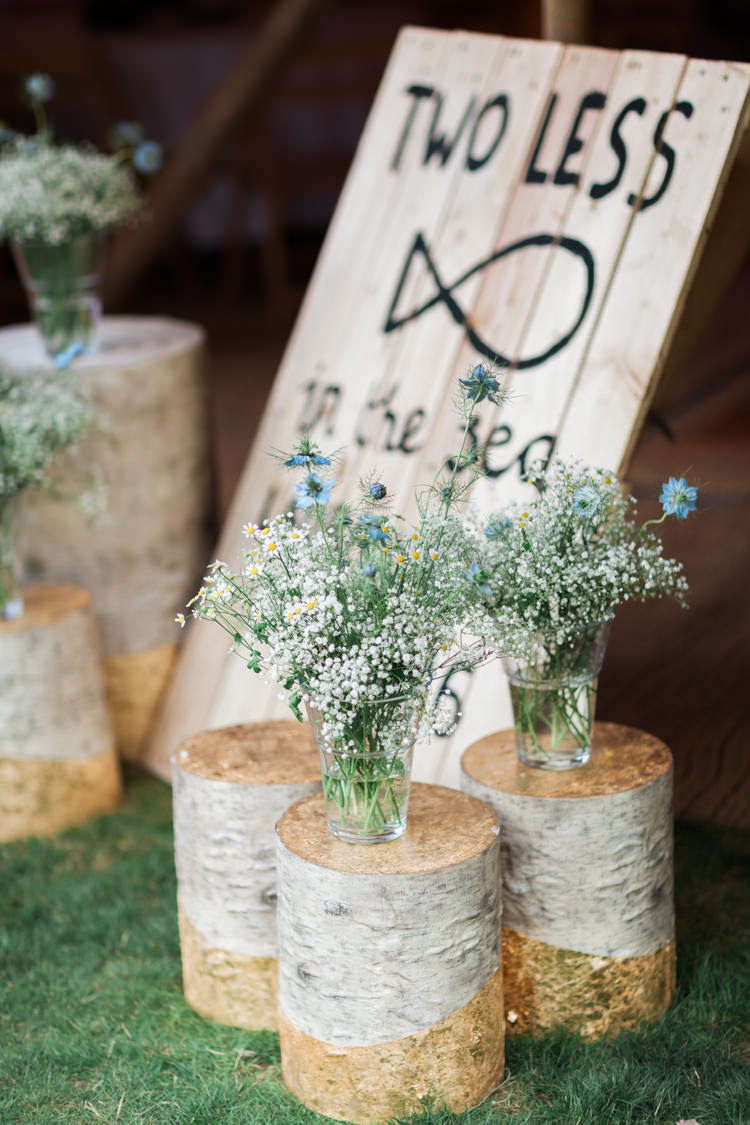 Log Flowers Decor Outdoor Beautifully Romantic Eclectic Tipi Wedding http://www.jobradbury.co.uk/