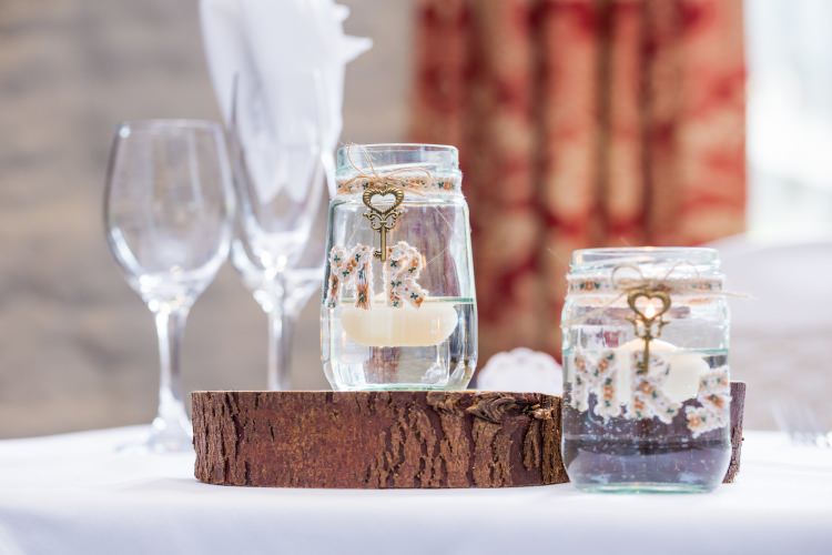 Jar Floating Candles Mr Mrs Vintage Flower Material Key Table Centre Detail Decor Pretty Quirky Pastel Wedding http://www.happilyevercaptured.com/