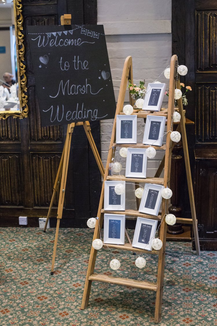 Welcome Sign Blackboard Chalk Board Stepladder Table Plan Easel Seating Chart Frames String Lights Detail Decor Pretty Quirky Pastel Wedding http://www.happilyevercaptured.com/
