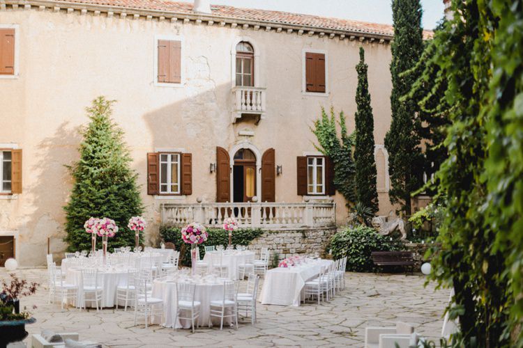 Outdoor Reception White Tables Chairs Romantic Vibrant Pink Wedding Trieste http://www.emotionttl.com/en/home/