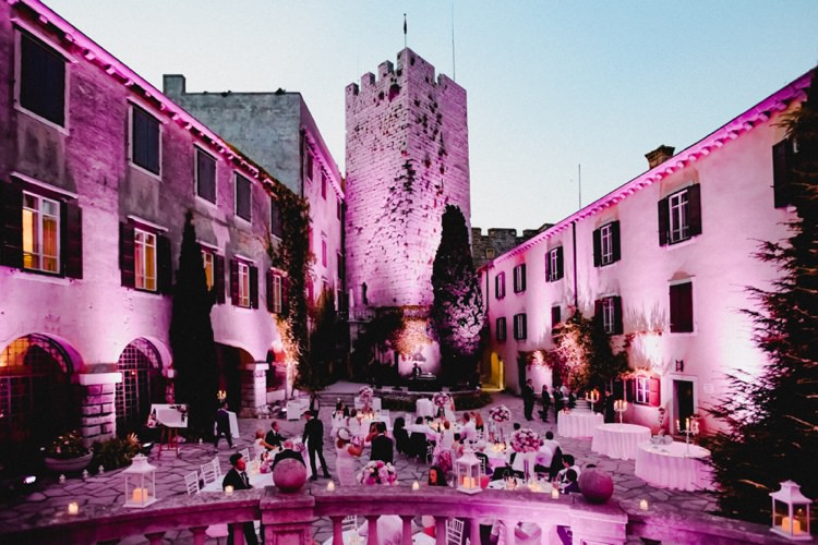 Castle Courtyard Reception Lighting Romantic Vibrant Pink Wedding Trieste http://www.emotionttl.com/en/home/