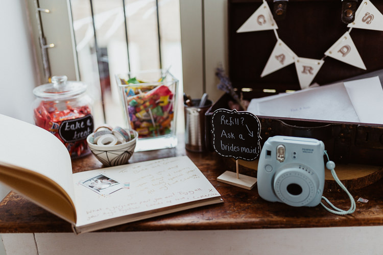 Polariod Guest Book Photo Beautifully Relaxed Outdoorsy Barn Wedding http://www.caitlinandjones.co.uk/