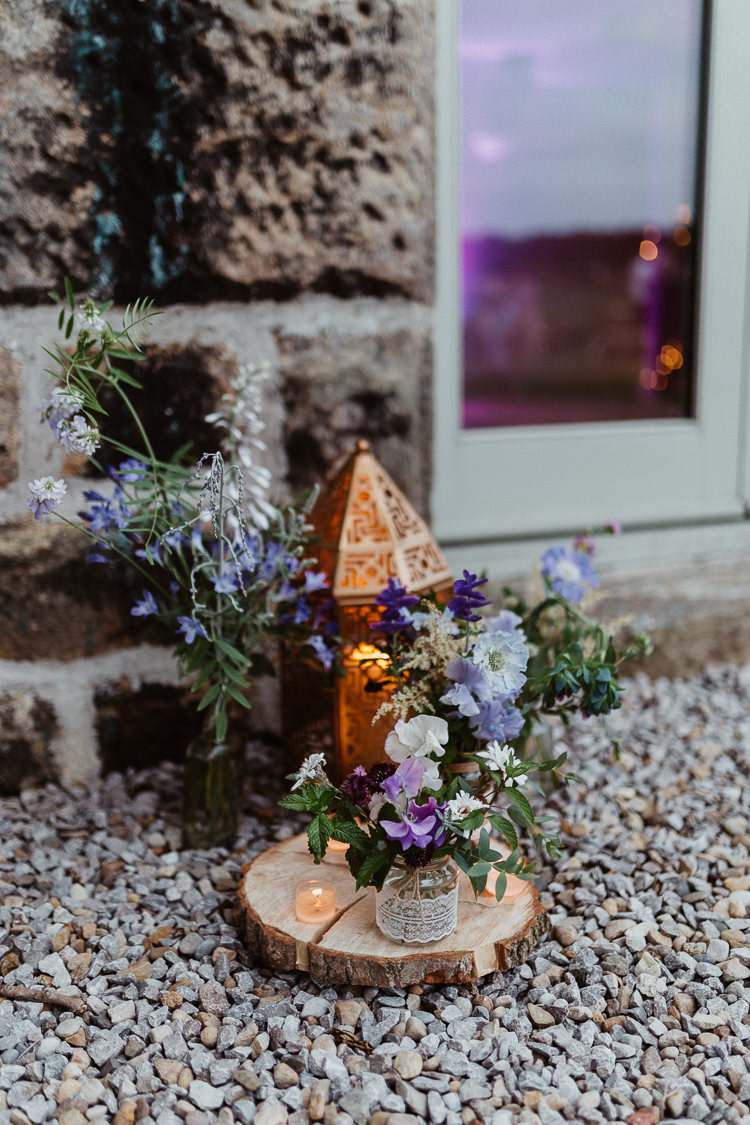 Lanterns Candles Log Flowers Jars Decor Beautifully Relaxed Outdoorsy Barn Wedding http://www.caitlinandjones.co.uk/