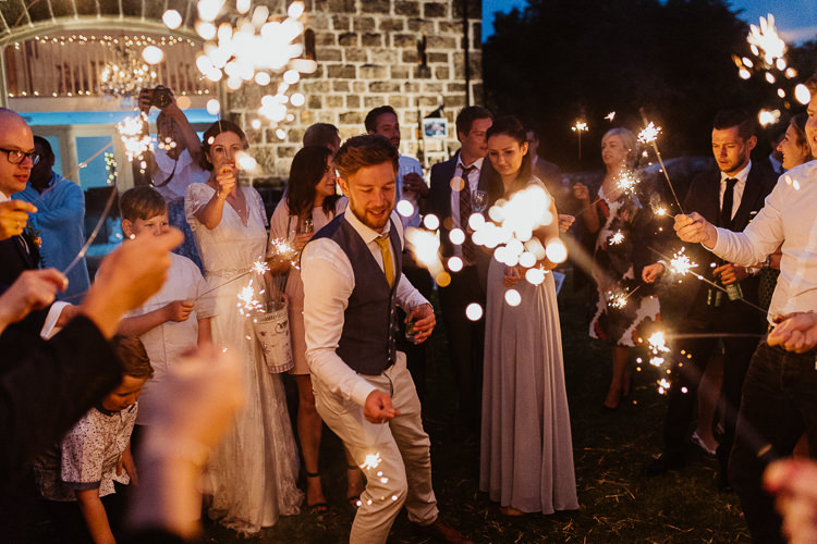 Sparklers Beautifully Relaxed Outdoorsy Barn Wedding http://www.caitlinandjones.co.uk/