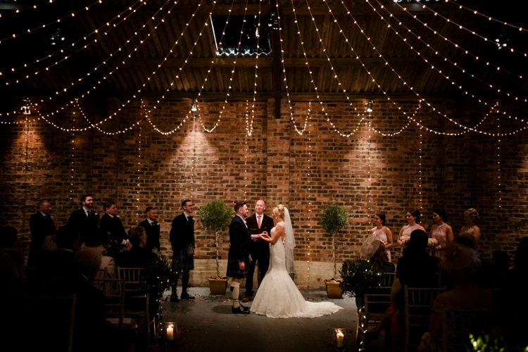 Fairy Lights Ceremony Magical Blush Pink Gold Barn Wedding http://www.johnjohnstonphotography.co.uk/
