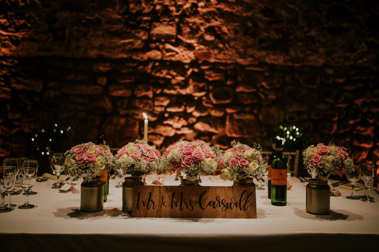 Jar Flowers Roses Sign Calligraphy Wooden Magical Blush Pink Gold Barn Wedding http://www.johnjohnstonphotography.co.uk/