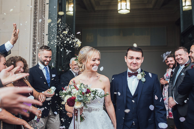 Confetti Throw Bride Groom Town Hall Liverpool Stylish Lakeside City Wedding http://www.struthphotography.com/