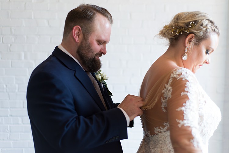 Bride Getting Ready Buttons Groom Romantic Industrial Studio Loft Georgia Wedding http://krisandraevans.com/