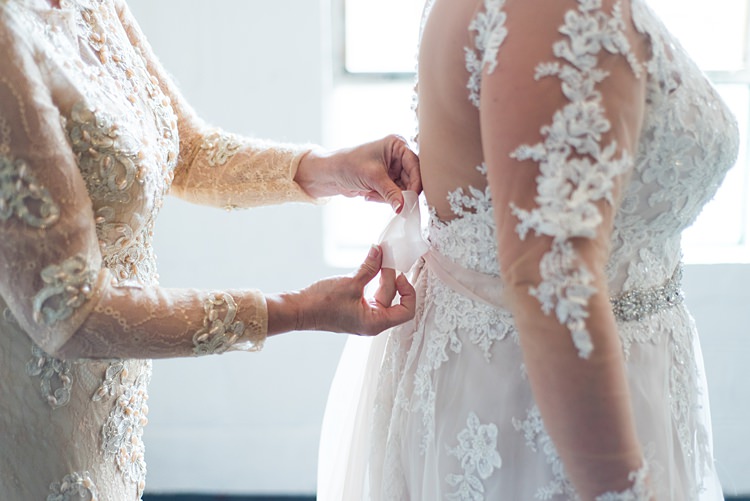 Lace Sleeves Bride Getting Ready Bow Romantic Industrial Studio Loft Georgia Wedding http://krisandraevans.com/