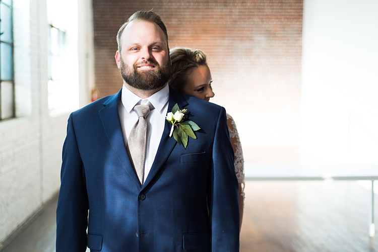 Bride Groom Embrace Romantic Industrial Studio Loft Georgia Wedding http://krisandraevans.com/