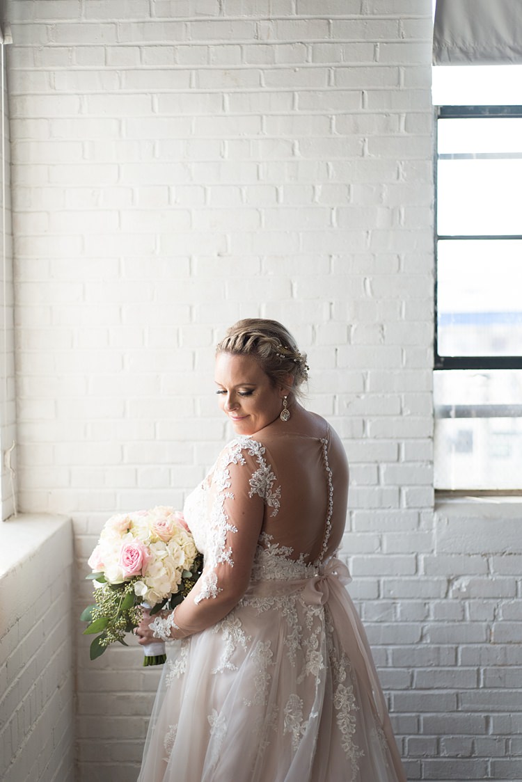 Bride Dress Back Detail Lace Sleeves Buttons Romantic Industrial Studio Loft Georgia Wedding http://krisandraevans.com/