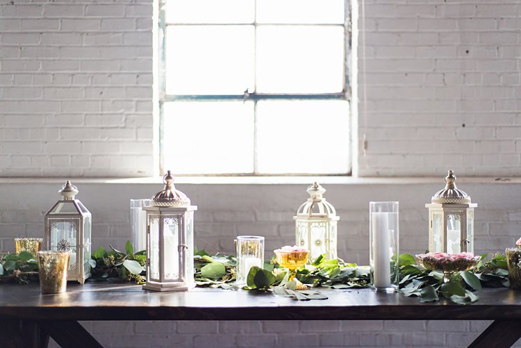 Lanterns Candles Table Greenery Romantic Industrial Studio Loft Georgia Wedding http://krisandraevans.com/