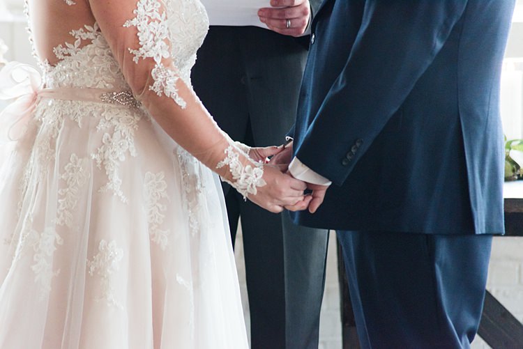 Bride Groom Handholding Ceremony Romantic Industrial Studio Loft Georgia Wedding http://krisandraevans.com/