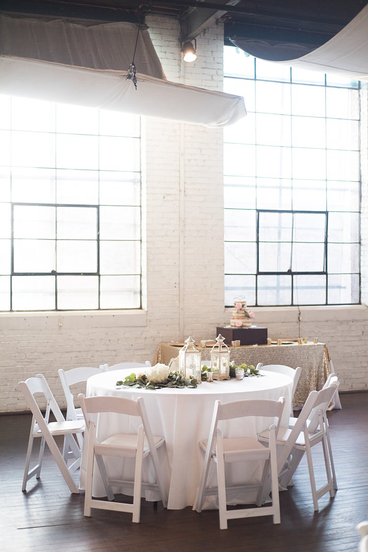 Centrepieces Table Decoration Lantern Greenery Romantic Industrial Studio Loft Georgia Wedding http://krisandraevans.com/