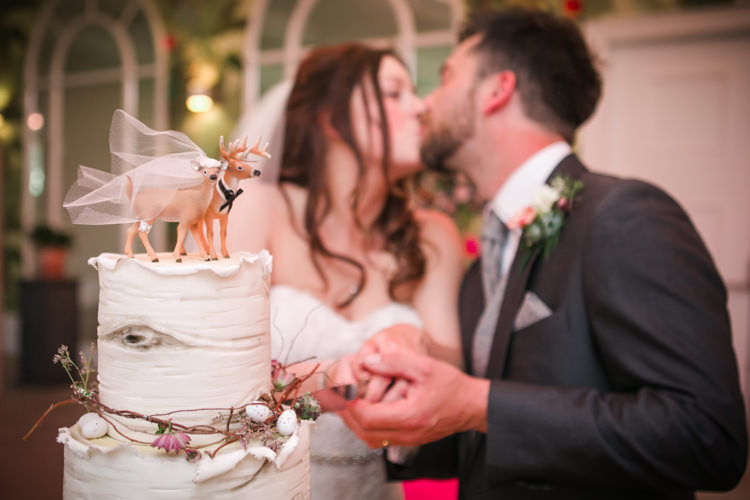 Cake Cutting Wood Twigs Mini Eggs Deer Topper Bride Groom Easter Spring Woodland Wedding http://emmastonerweddings.com/