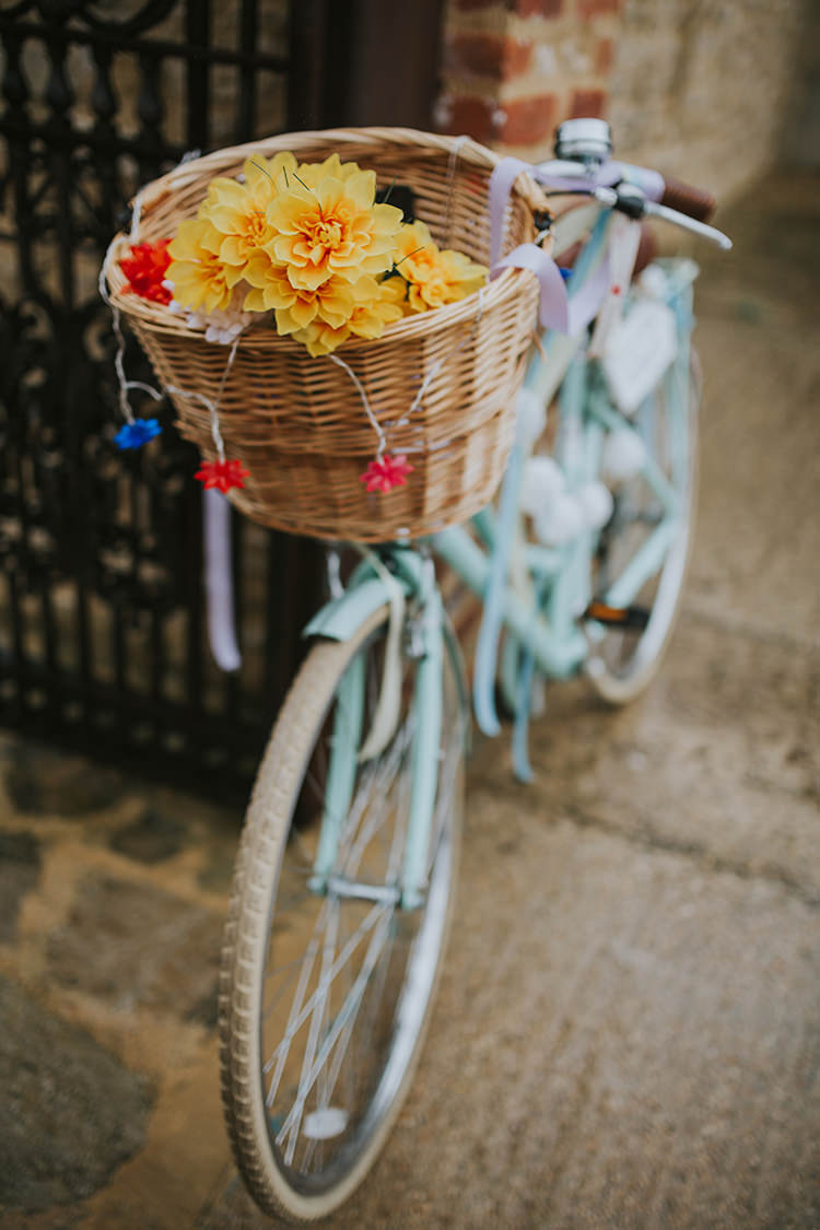 Bicycle Decor Sign Welcome Basket Flowers Colourful Quirky Down To Earth Wedding http://jenmarino.com/