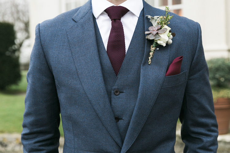 Groom Cad and the Dandy Three Piece Wool Blue Waistcoat Burgandy Blue Pocket Square Gorgeously Glam New Years Eve Wedding http://www.photographybykrishanthi.co.uk/