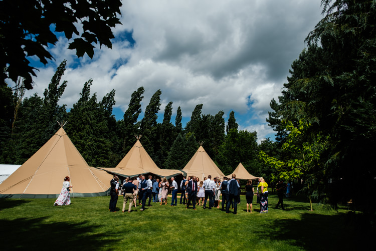 Fun Loving Secret Garden Tipi Wedding https://www.aaroncollettphotography.co.uk/