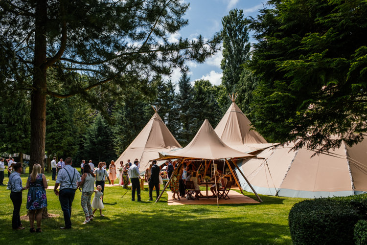 Fun Loving Secret Garden Tipi Wedding https://www.aaroncollettphotography.co.uk/