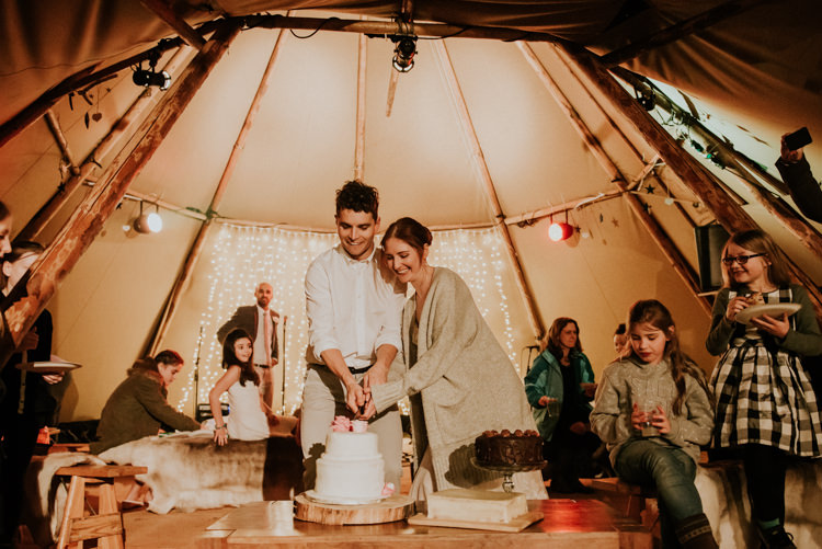 Cake Table Cutting Wood Slice Magical Cosy Forest Tipi Wedding http://katewatersphotography.com/