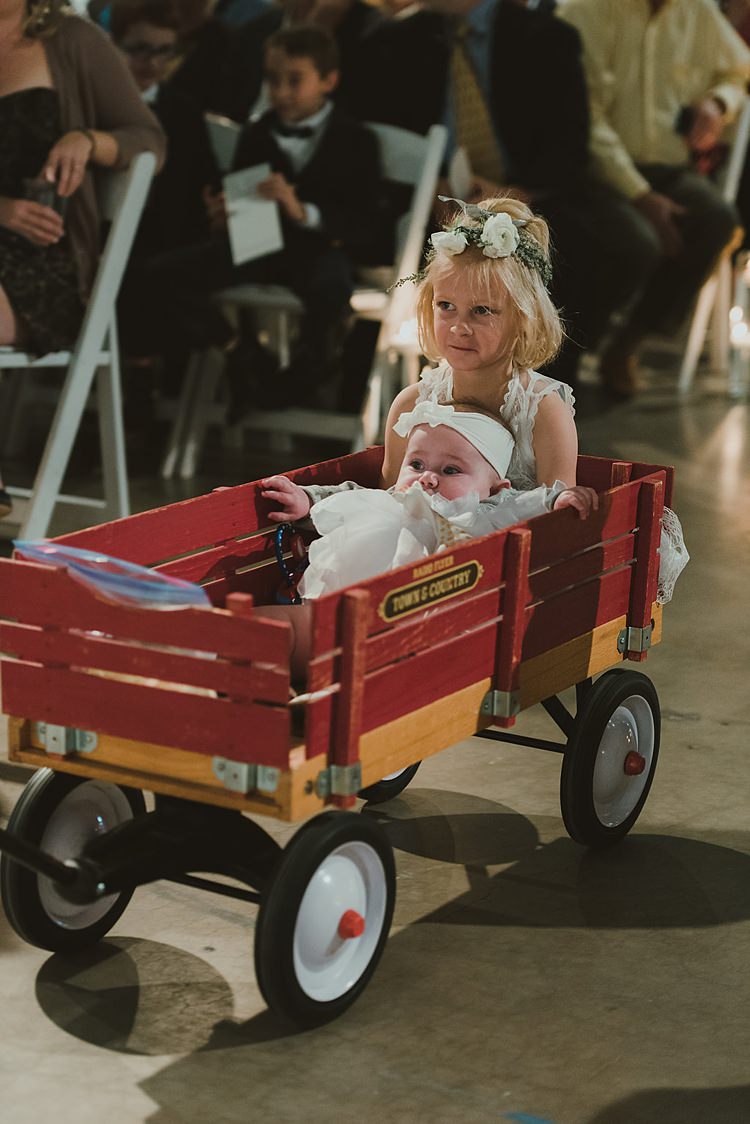 Flower Girl Wagon Aisle Cart Hip Art Gallery Wedding Colorado http://www.lisarundallphotography.com/