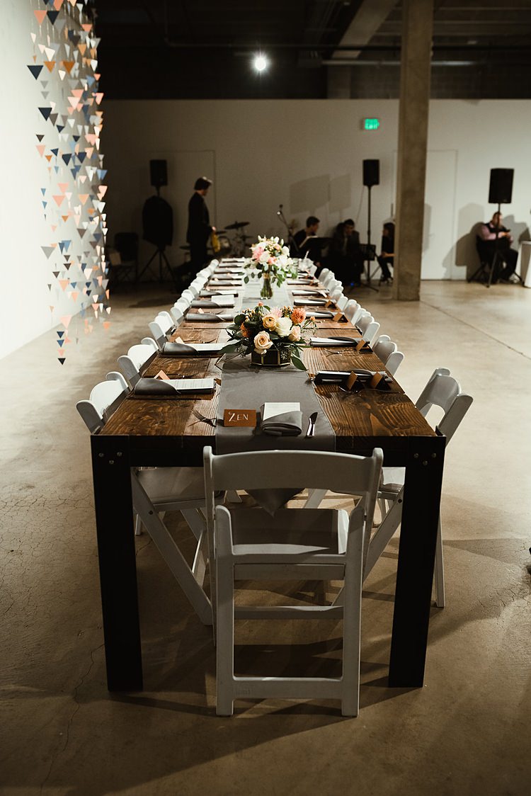 Long Rustic Tables Hip Art Gallery Wedding Colorado http://www.lisarundallphotography.com/