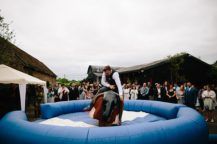 Rodeo Game Entertainment Indie Outdoorsy Cowshed DIY Wedding http://www.danhoughphoto.com/