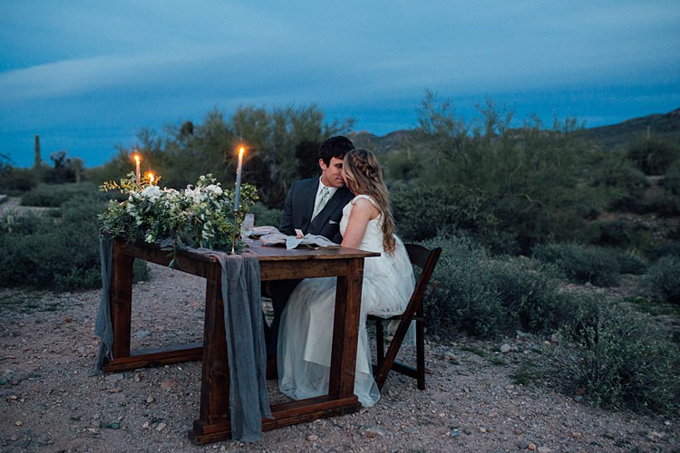 Bride Groom Close Seated Candlelight Romantic Desert Elopement Ideas http://beginningandendphoto.com/