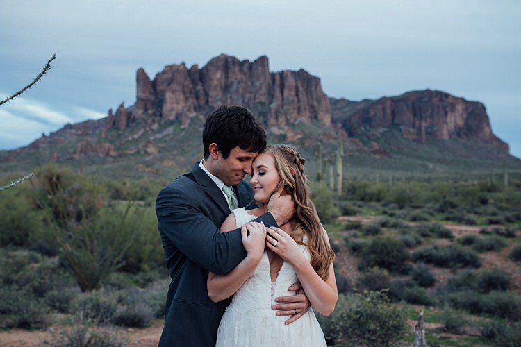Bride Groom Embrace Romantic Desert Elopement Ideas http://beginningandendphoto.com/
