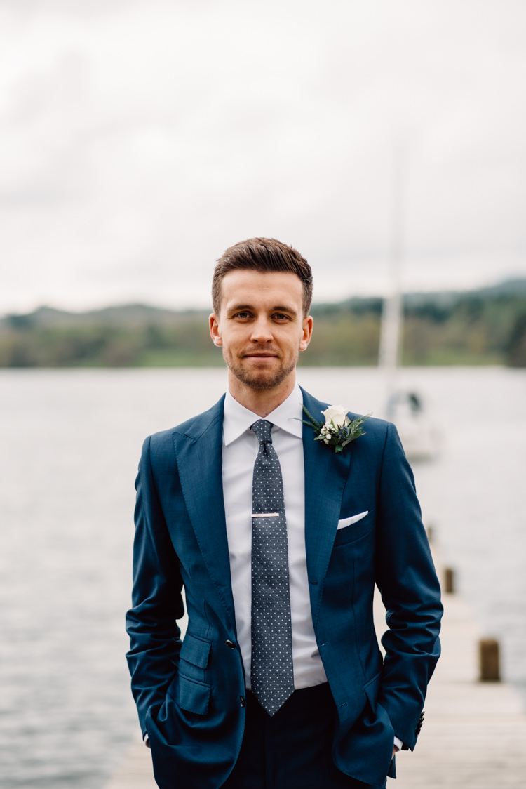 Navy Blue Suit Groom Polka Dot Tie Bespoke Custom Delightfully Stylish Spring Wedding in the Lake District http://jamiedunnphotography.com/