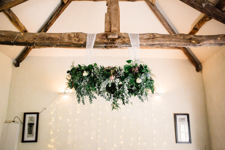 Hanging Hoop Flowers Ceremony Foliage Greenery Delightfully Stylish Spring Wedding in the Lake District http://jamiedunnphotography.com/