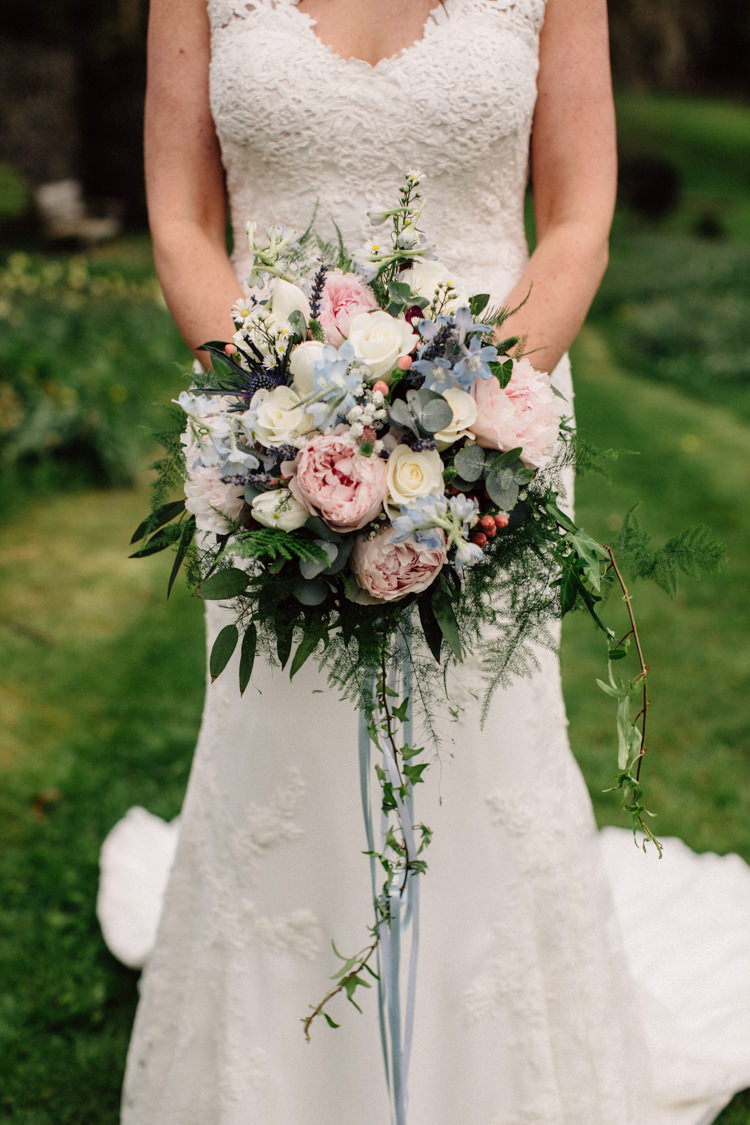 Bouquet Flowers Bride Bridal Prony Thistle Fern Rose Pink Blue Cream Delightfully Stylish Spring Wedding in the Lake District http://jamiedunnphotography.com/