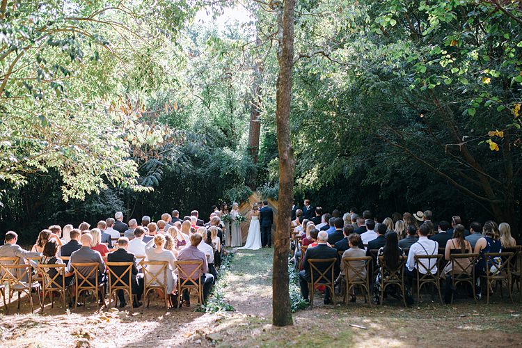 Ceremony Guests Trees Bohemian Outdoor Greenery Wedding Georgia http://www.sowingclover.com/