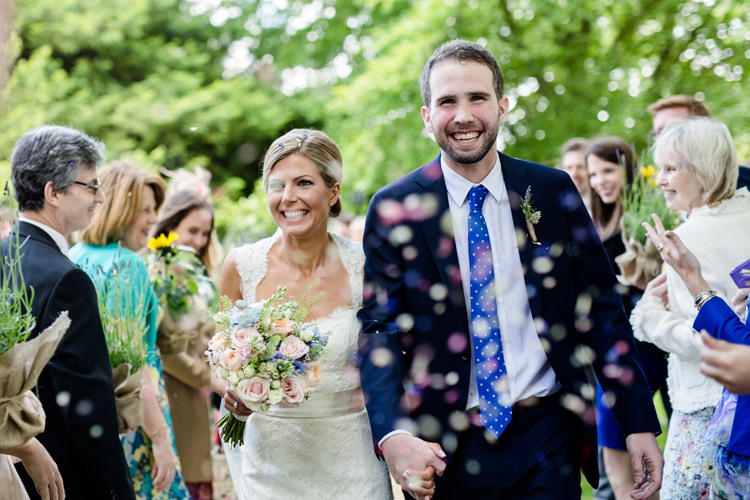 Confetti Shot Moment Bridal Bridal Paloma Blanca Gown Dress Suit Supply Groom Navy Blue Pretty Relaxed Lavender Country Wedding http://www.lydiastampsphotography.com/
