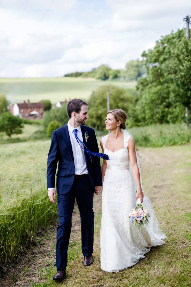 Bride Bridal Paloma Blanca Straps Suit Supply Groom Navy Blue Pastel Bouquet Pretty Relaxed Lavender Country Wedding http://www.lydiastampsphotography.com/